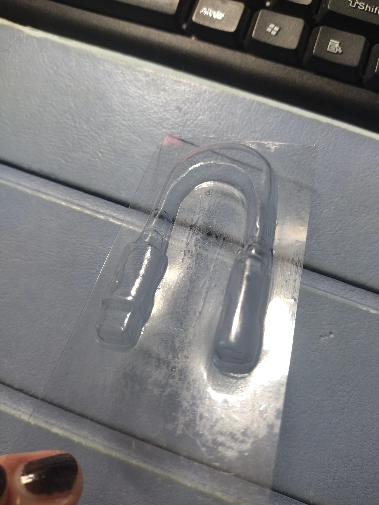 Supporto di plastica dell'adattatore interno alla confezione